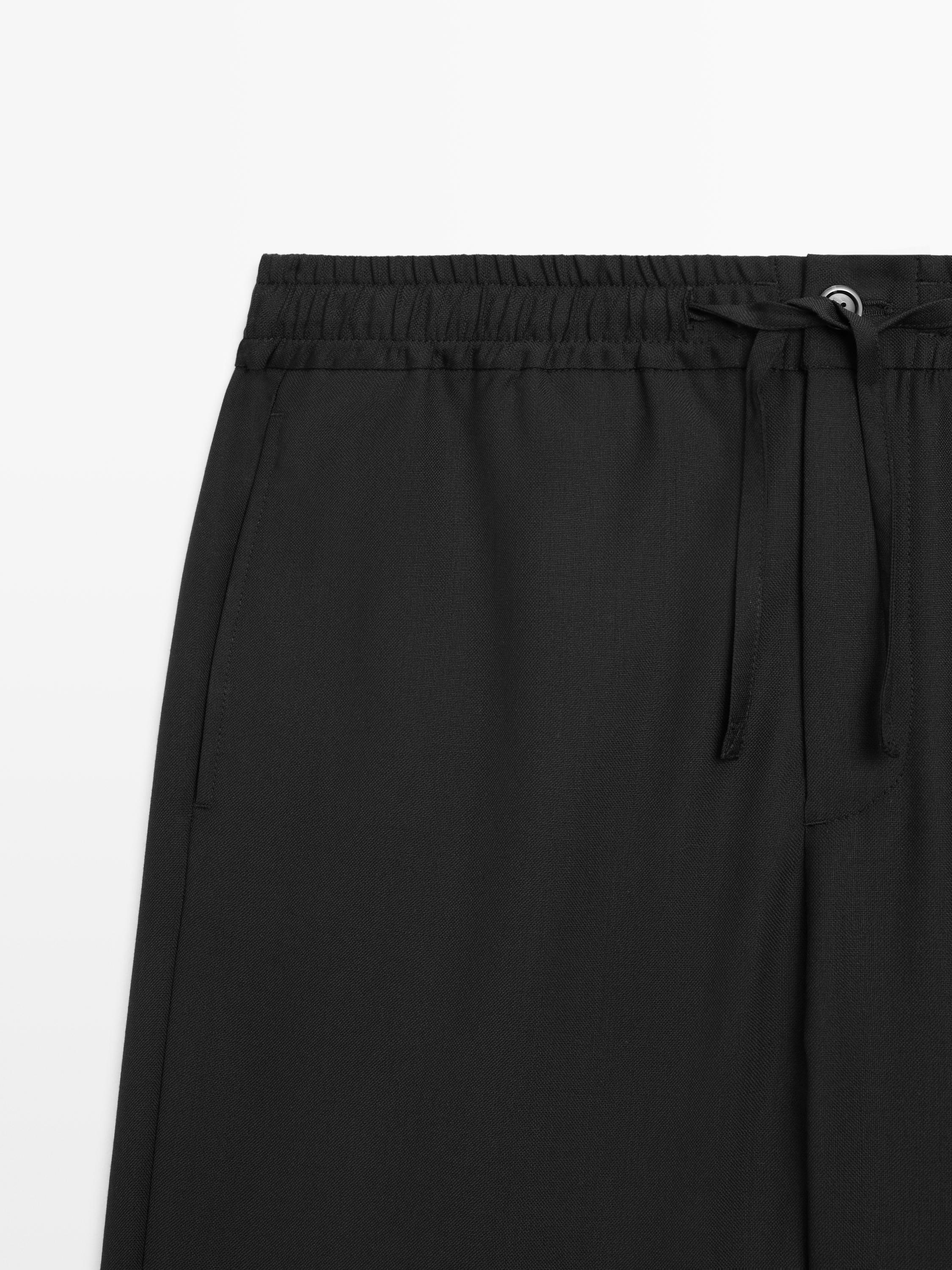 Relaxed fit 100% wool trousers